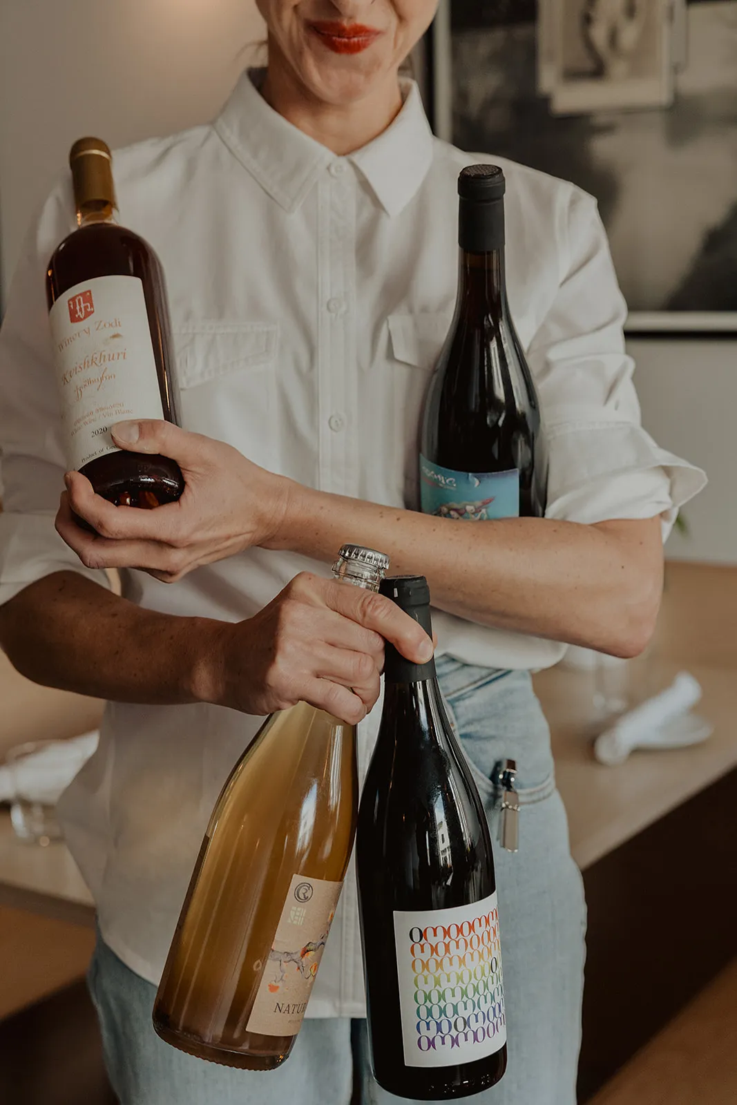 Women holding some of the wines available at Wildling Restaurant